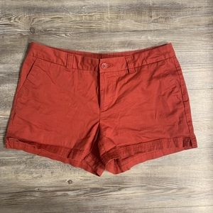 Red Magellan outdoor shorts. Mid rise with three inch inseam. Size 10.